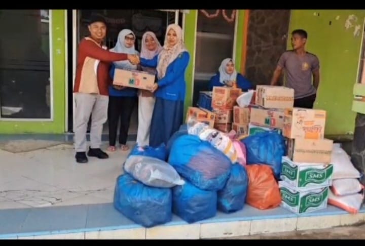 Penyerahan Bantuan dari Keluarga Besar Puskesmas Tanjung Beringin kepada Korban Banjir di Kab.Pesisi