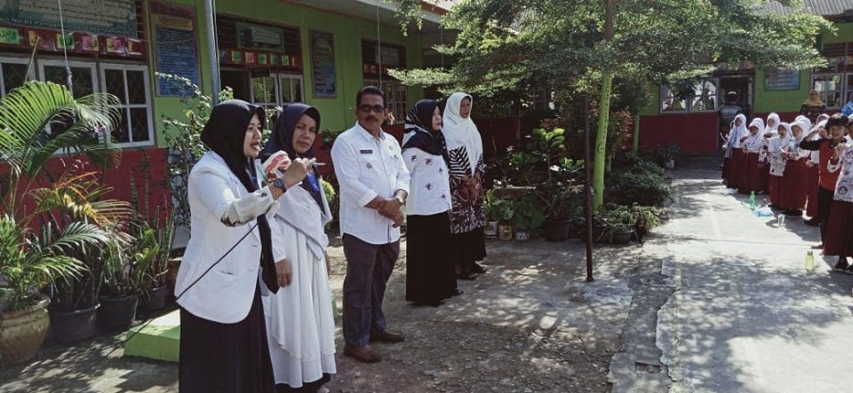 PELAKSANAAN USAHA KESEHATAN GIGI SEKOLAH (UKGS) DIWILAYAH KERJA UPT PUSKESMAS TAPAN