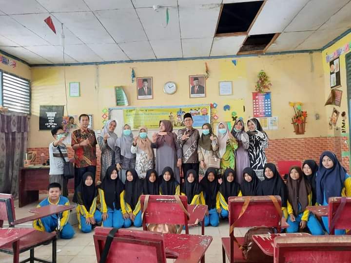   Kunjungan Kabid P2P Dinkes Pessel   bersama Kasi Pencegahan dan Penularan Penyakit   ke Posyandu P