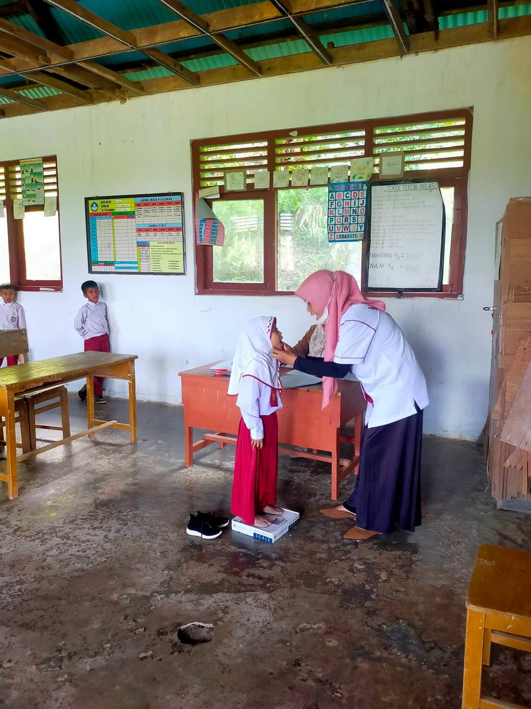 Puskesmas Pasar Kuok  melaksanakan  screaning kesehatan di SDN 18 Tanjung Kandis dan SDN 30 Koto Tuo