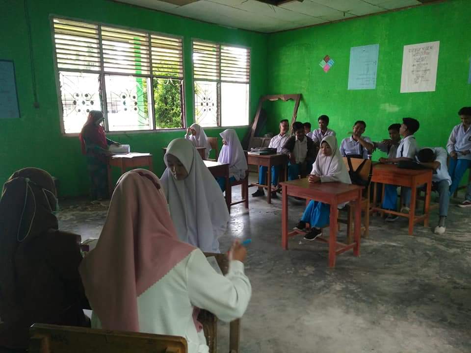 Posbindu Penyakit Tidak Menular (PTM) di MTs Nurul Yaqin diPdg.Mandiangin Puskesmas Kambang  Selasa,