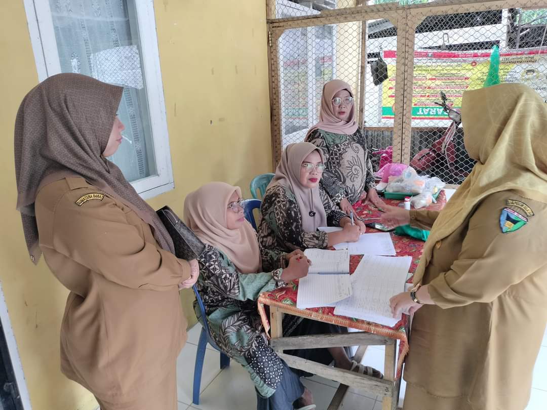 DINKES PESSEL MONITORING POSYANDU DAHLIA NAGARI SEBERANG TAROK  DAN KOORDINASI  KE PUSKESMAS KAMBANG