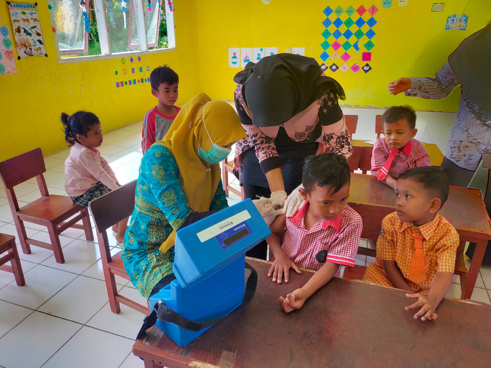 TIM IMUNISASI, PROMKES DAN BIDAN DESA MELAKSANAAN SOSIALISASI BIAN ( BULAN IMUNISASI ANAK NASIONAL )