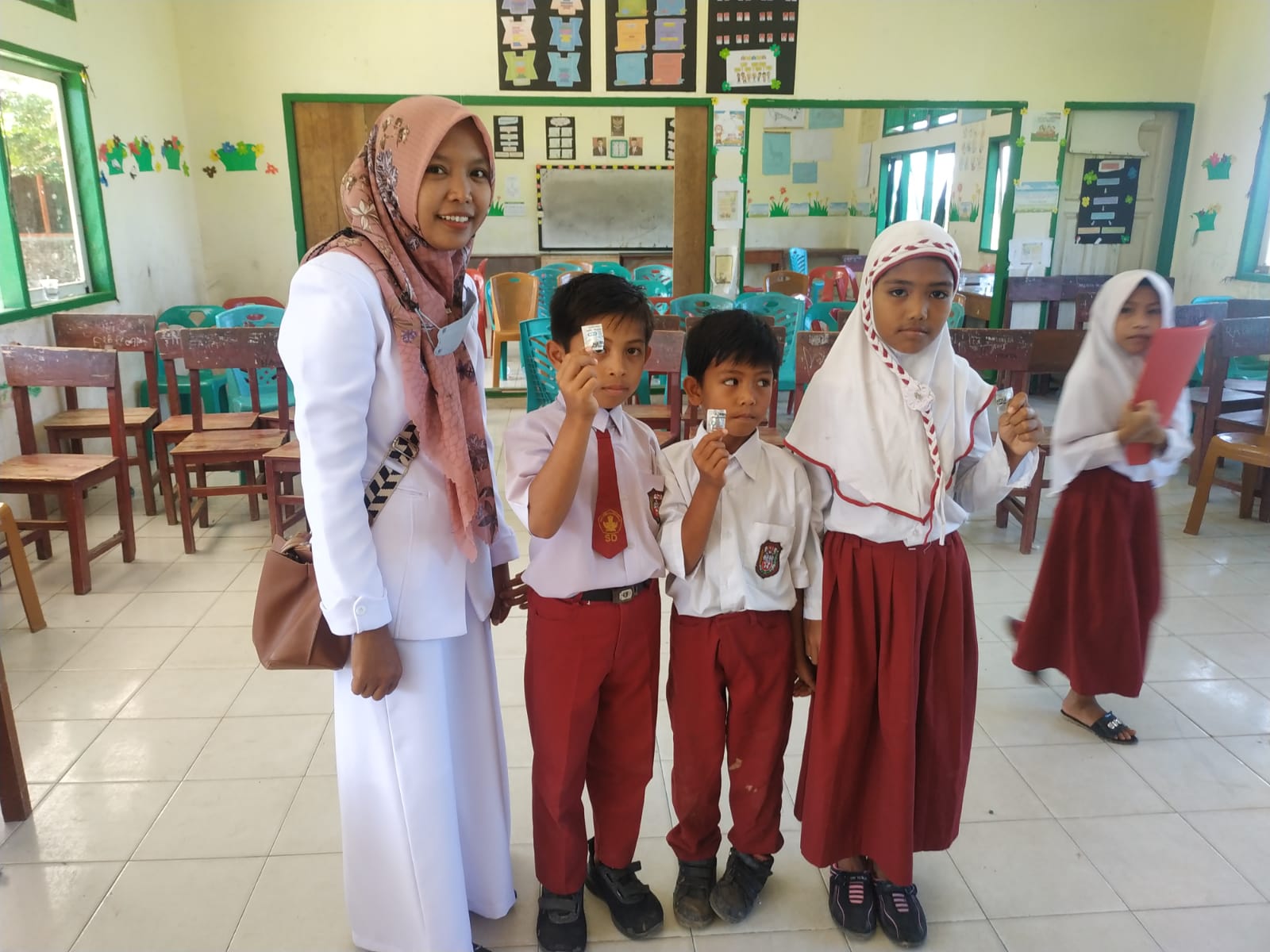 PELAKSANAAN SOSIALISASI BIAN ( BULAN IMUNISASI ANAK NASIONAL ) DI WILAYAH KERJA PUSKESMAS KAYU GADAN