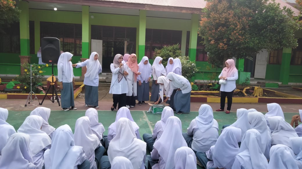 PEMBERIAN TABLET FE DI SMAN 3 LENGAYANG WILKER UPT PUSKESMAS KOTO BARU .