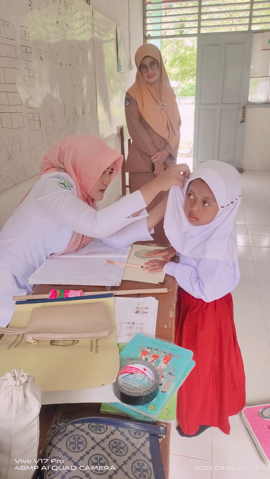 PENJARINGAN UKS DI  1. SDN  Wilker Puskesmas KOTO Baru