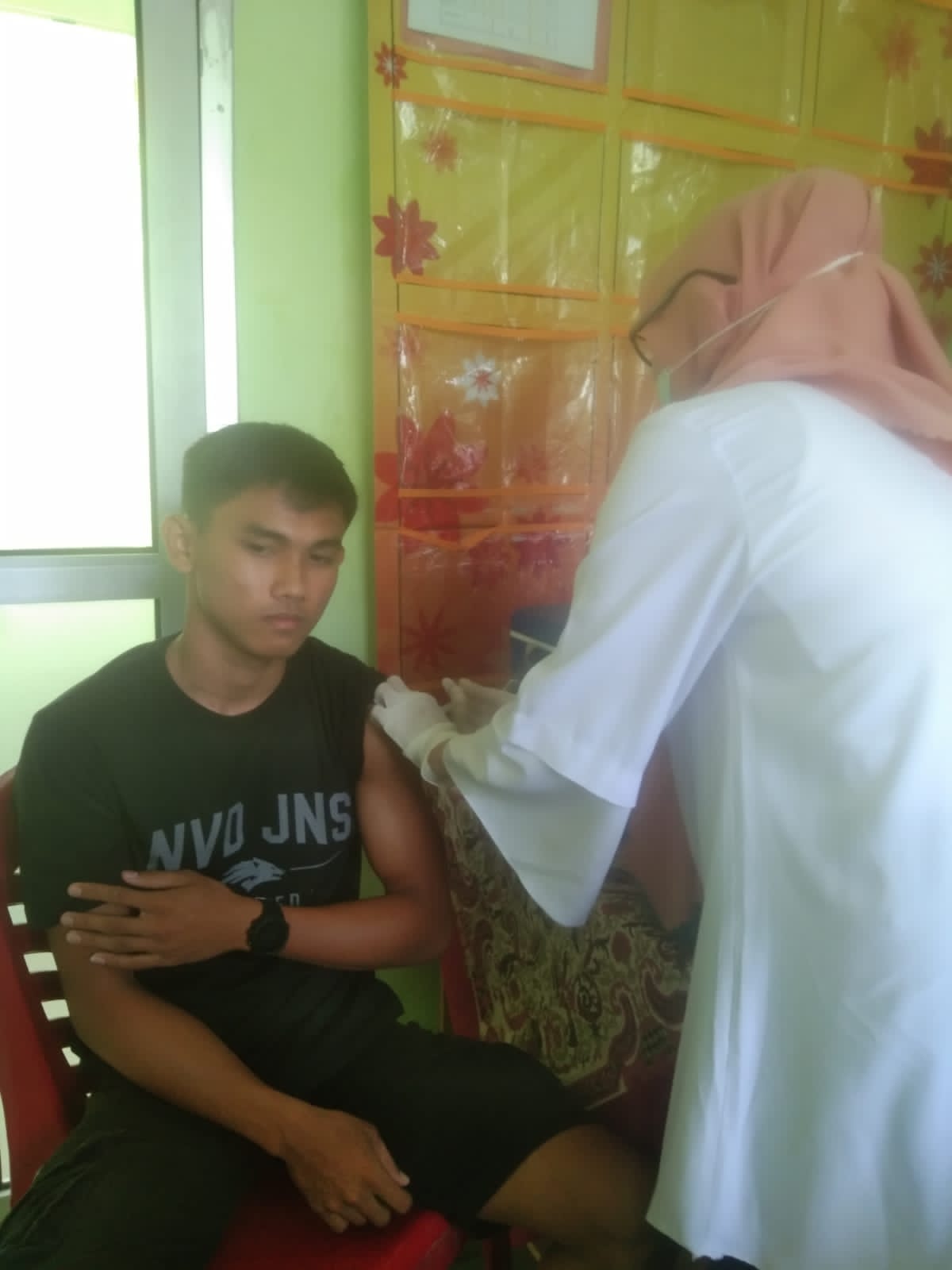 VAKSINASI COVID-19 DI PUSKESMAS IV KOTO MUDIK