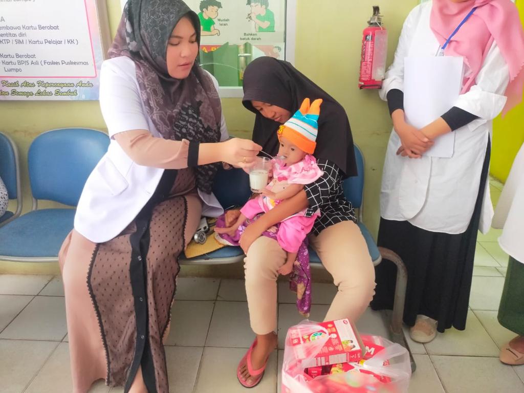 PEMBERIAN PMT PEMULIHAN UNTUK BALITA GIZI KURANG DI WILAYAH  UPT PUSKESMAS LUMPO