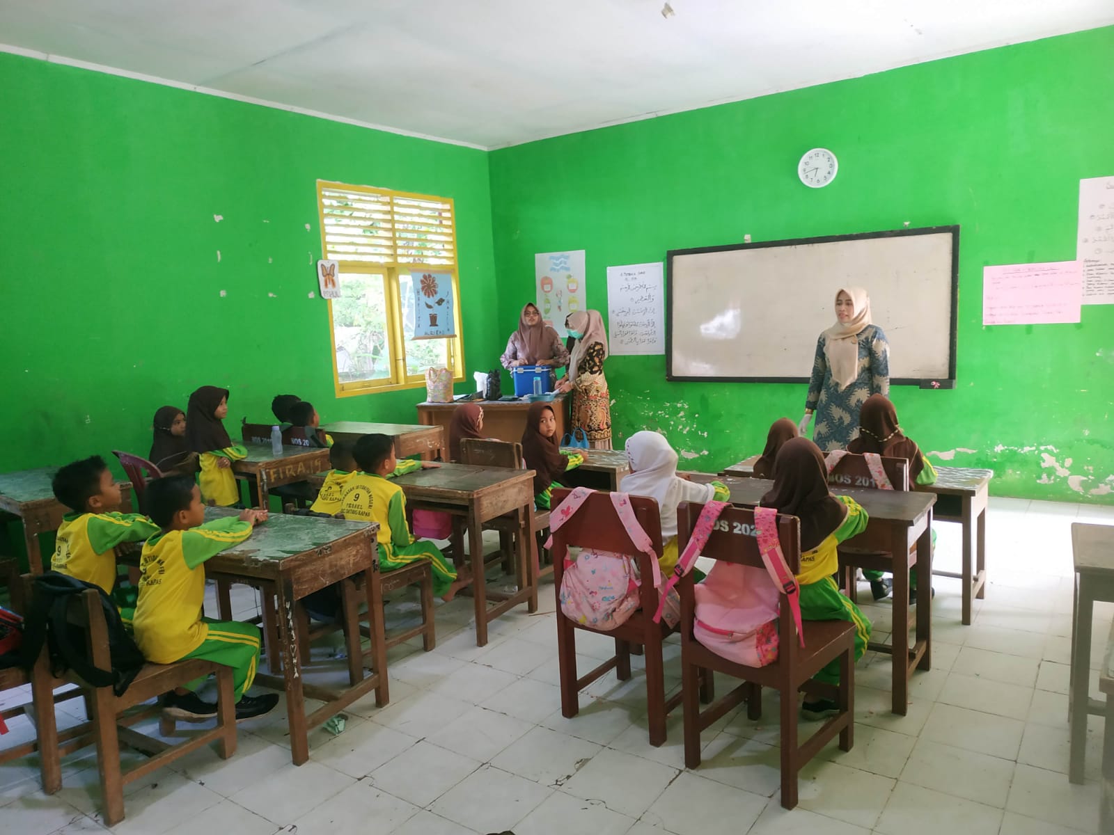 PUSKESMAS IV KOTO MUDIK LAKSANAKAN BULAN IMUNISASI ANAK SEKOLAH (BIAS) DT DAN TD di MIN 9 PESSEL