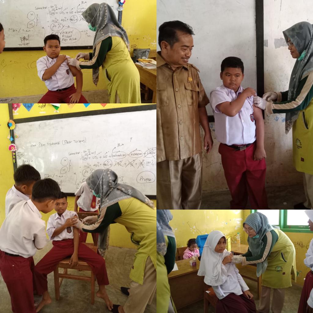 Tim Imunisasi Puskesmas Tanjung Makmur melakukan kegiatan Pemberian Imunisasi DT dan Td di SDN 03 Si