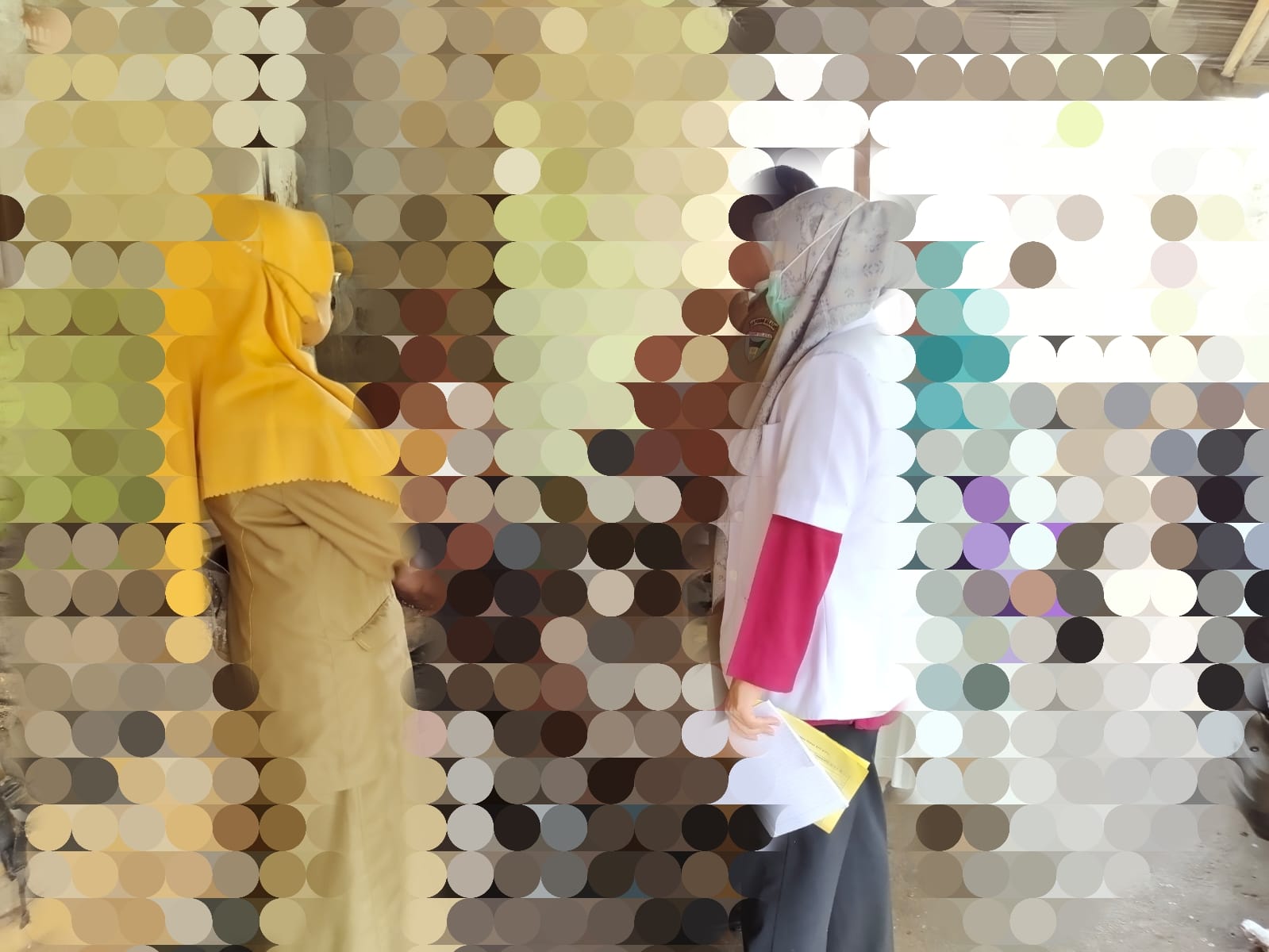 Pelaksanaan Vaksinasi kepada masyarakat di puskesmas kambang\" 