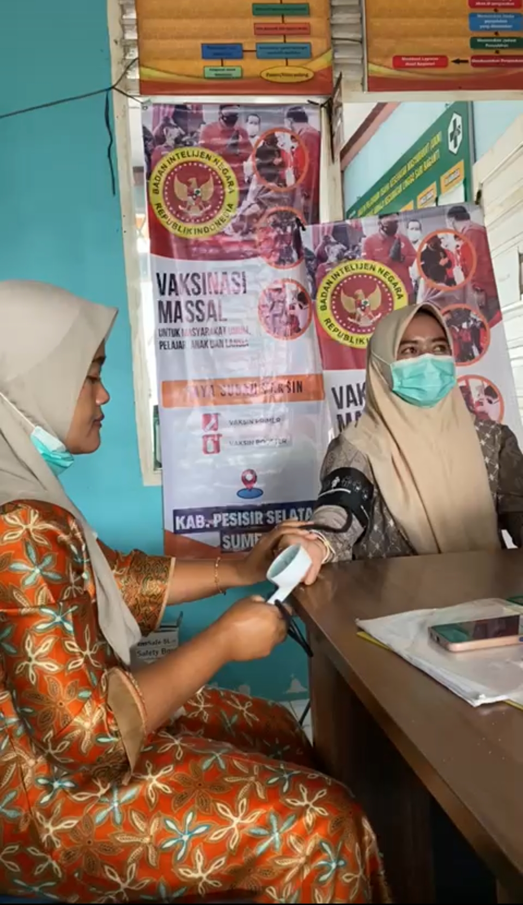 Pelaksanaan Kegiatan Vaksinasi Covid-19 di Posko Vaksinasi Puskemas Air Haji
