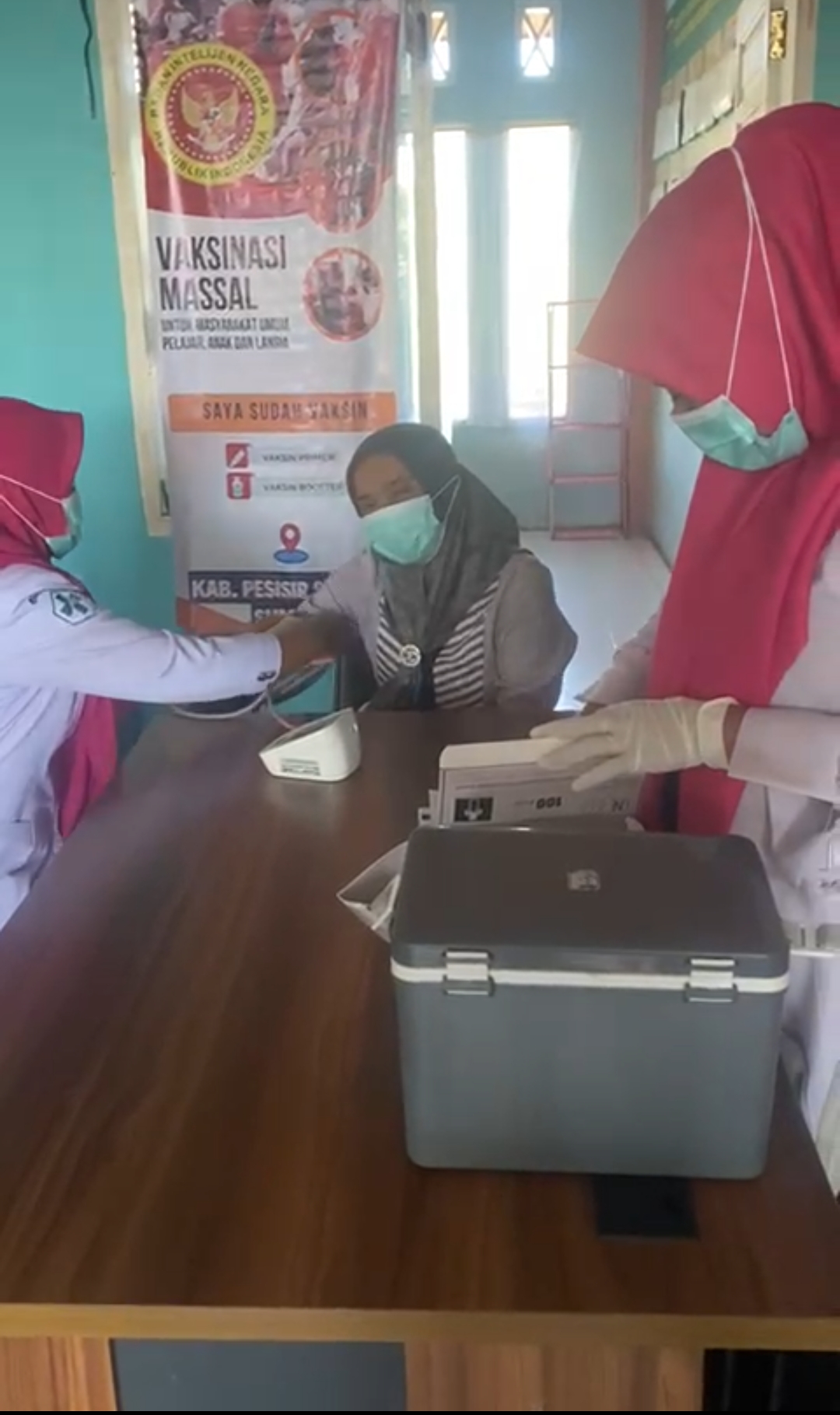 Pelaksanaan Kegiatan Vaksinasi Covid-19 di Posko Vaksinasi Puskemas Air Haji, 