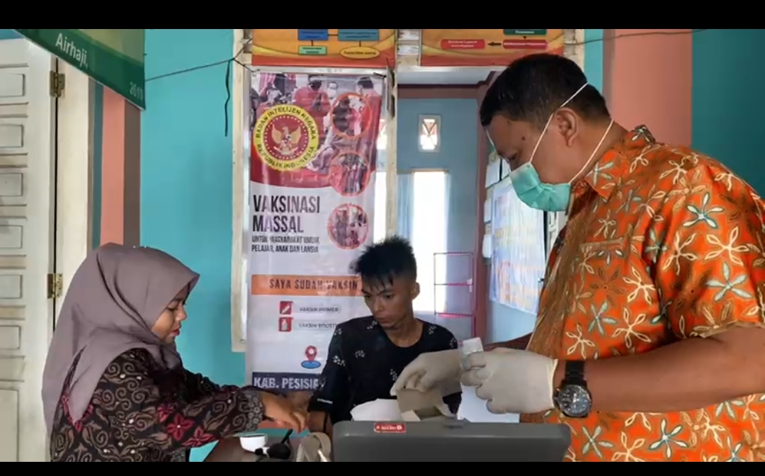 Pelaksanaan Kegiatan Vaksinasi Covid-19 di Posko Vaksinasi Puskemas Air Haji, 