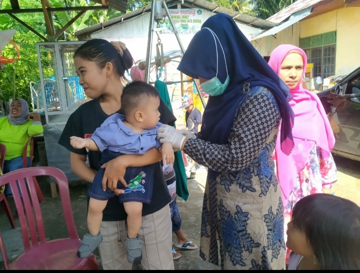 Puskesmas Koto Berapak mengadakan kegiatan imunisasi dalam rangka mensukseskan BIAN (Bulan Imunisasi