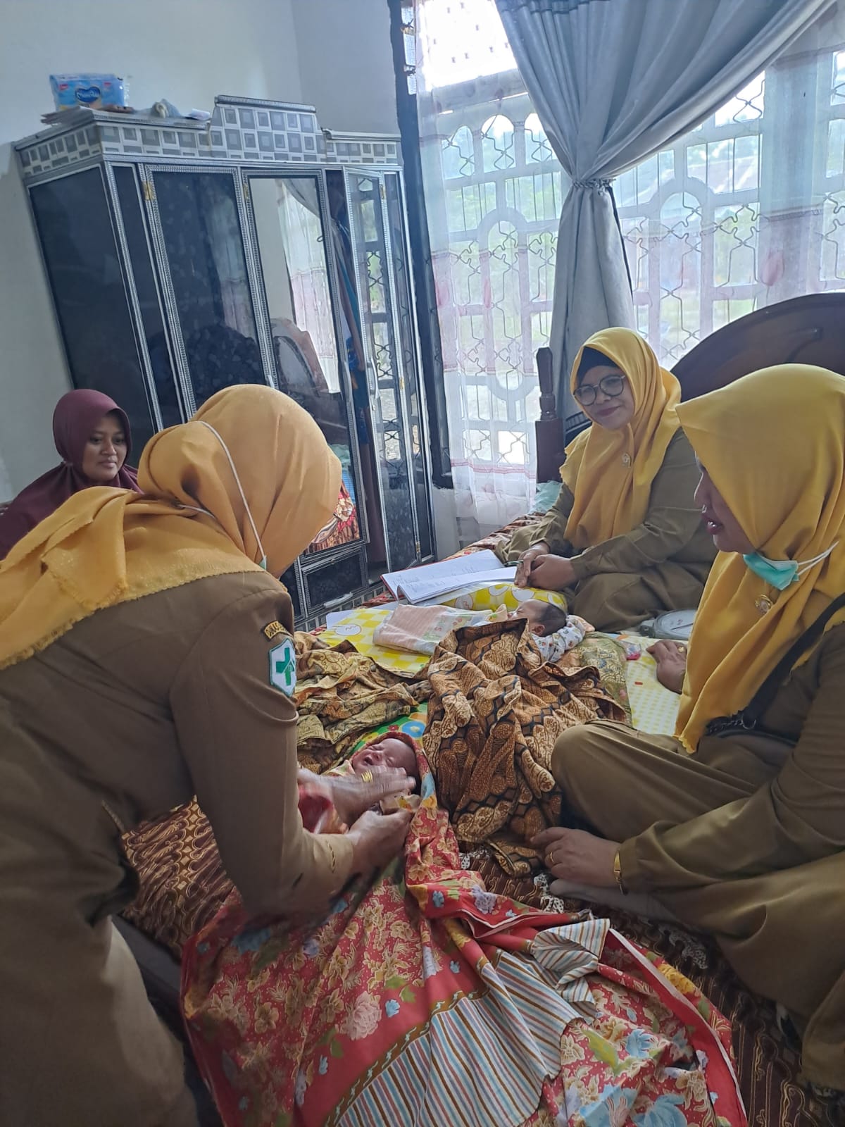 Puskesmas Tanjung Makmur Petugas KIA dan Bidan desa malakukan kunjungan BBLR ke Nagari Pasir Binjai