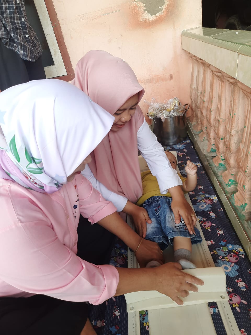 Penimbangan masal dan pemberian vitamin  Puskesmas IV koto mudik