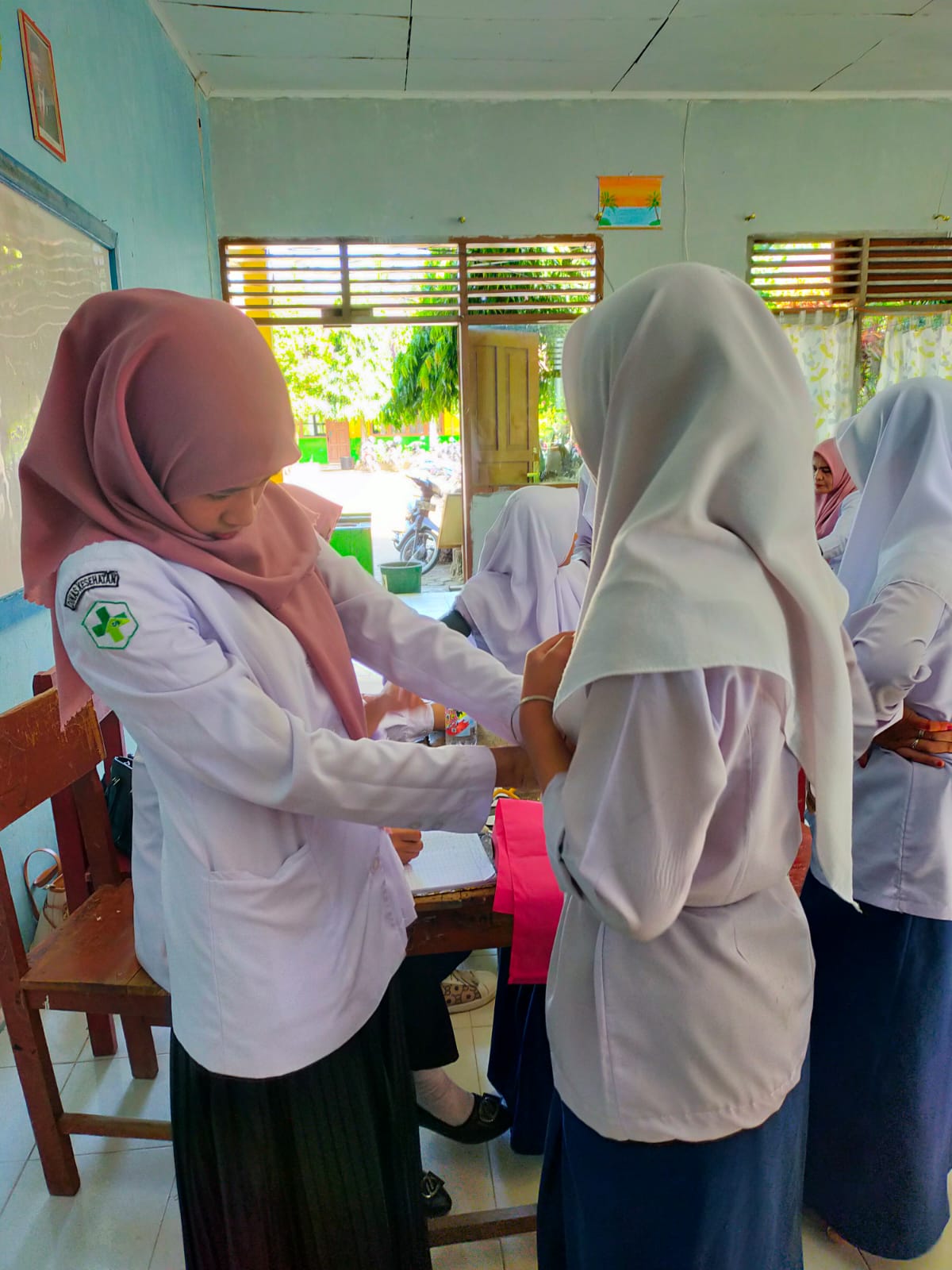 Posbindu Penyakit Tidak Menular (PTM) disekolah MTs M Lakitan wilayah kerja Puskesmas Kambang
