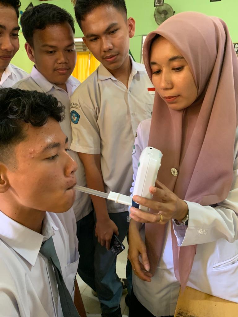 PELAKSANAAN SKRINING PRILAKU MEROKOK (UBM) KOLABORASI DENGAN PTM DI SEKOLAH SMAN 1 BATANG KAPAS