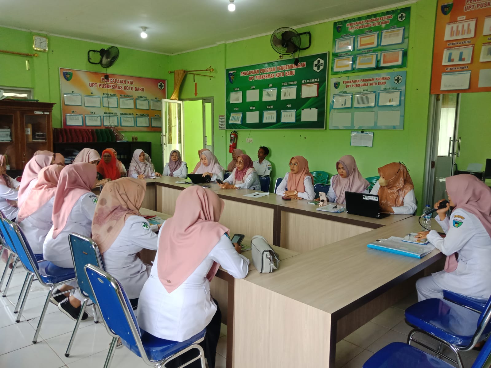 Lokmin bulanan di aula Puskesmas Koto Baru