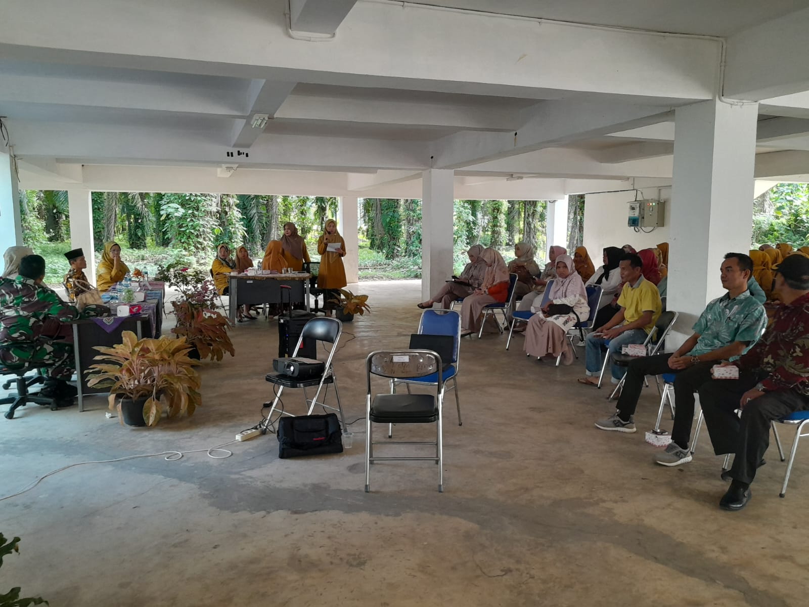 Pertemuan Sosialisasi dan Koordinasi Lintas Program Pelayanan Kesehatan di Aula Puskesmas Kayu Gadan