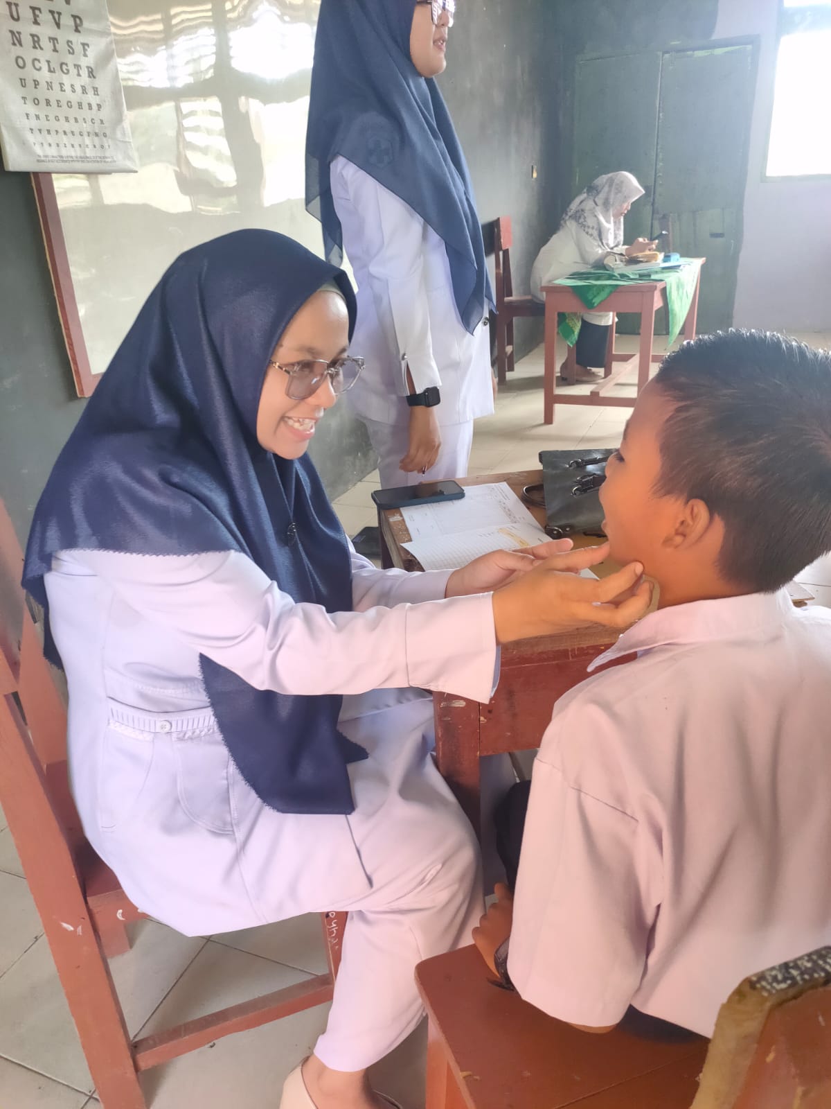 PUSKESMAS PASAR KUOK PELAKSANAAN SCREANING KESEHATAN SISWA MTSN 13 PESISIR SELATAN