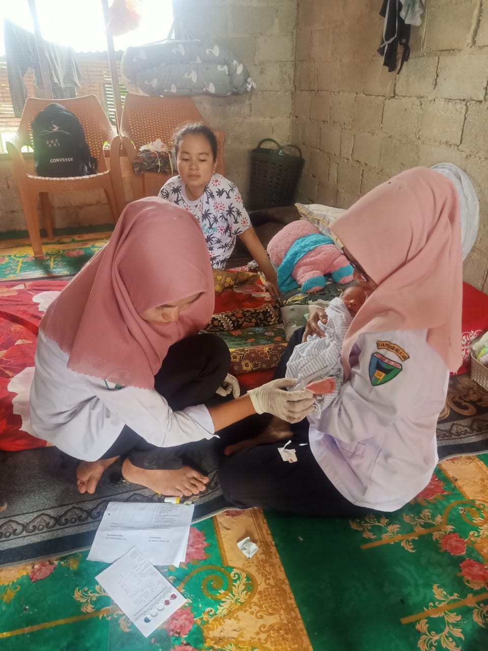Melaksanakan kegiatan Skrining Hipotiroid Kongenital (SHK) di Lan Panjang, Wilayah Kerja Puskesmas S