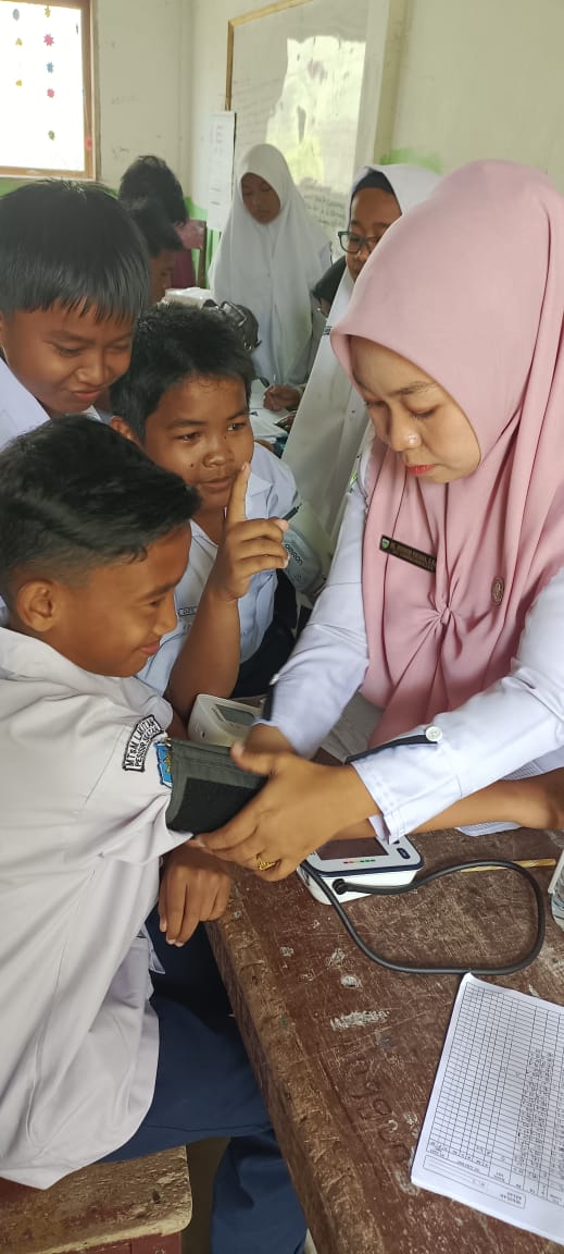Kegiatan UKS (Penjaringan Kesehatan) peserta didik MTsM Lakitan wilker Puskesmas Kambang