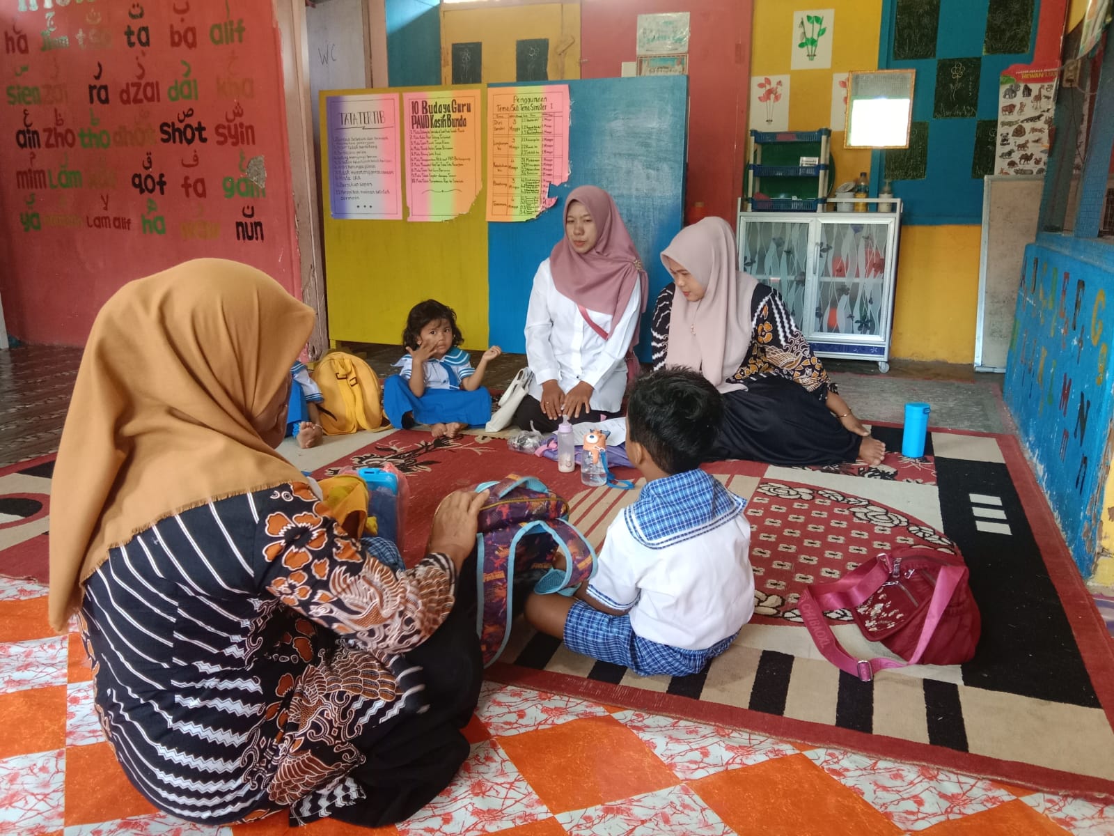 KEGIATAN PEMBERIAN OBAT PENCEGAHAN MASSAL ( POPM ) DI PAUD KASIH BUNDA KAPUH WILAYAH KERJA PUSKESMAS