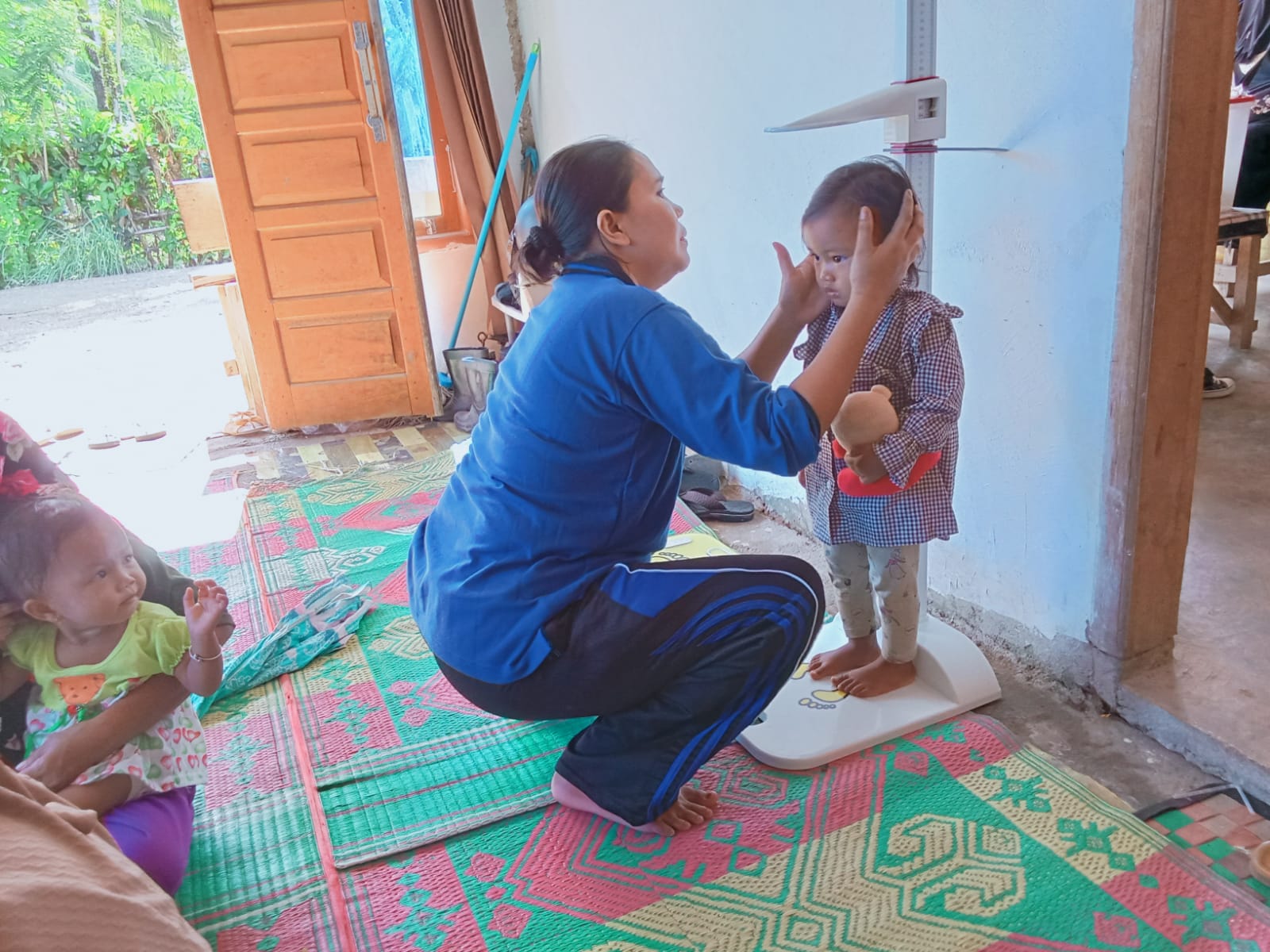 PKM BALAI SELASA PEMBERIAN KAPSUL VITAMIN A DAN PENIMBANGAN MASSAL DI POSYANDU HARAPAN IBU SUNGAI LI