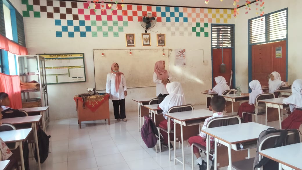 PKM KOTO BARU PELAKSANAAN KEGIATAN PEMBENTUKAN DAN PENYULUHAN KADER PKPR TINGKAT SD