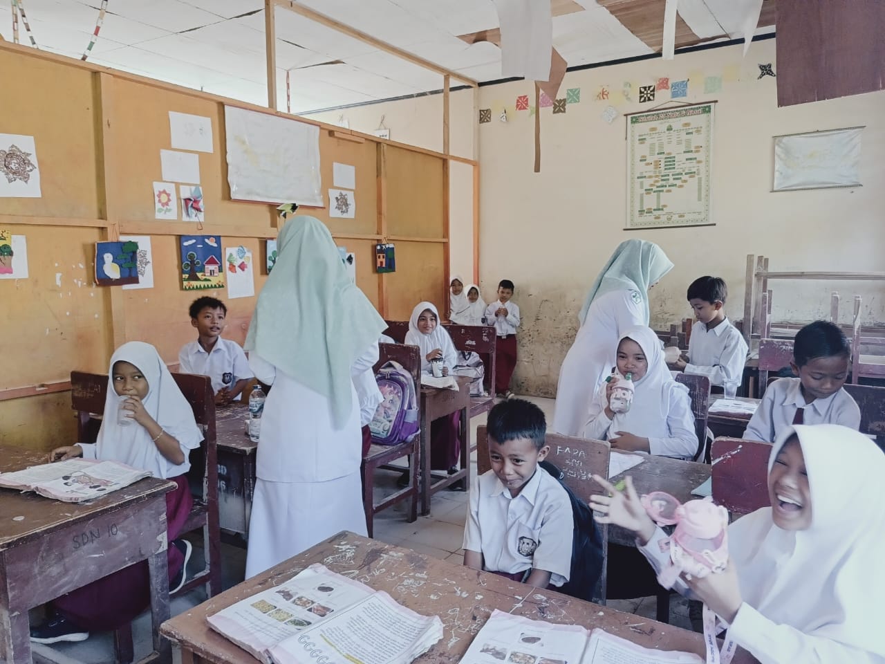 Pelaksanaan Pemberian Obat Pencegahan Massal (POPM) Puskesmas Kayu Gadang
