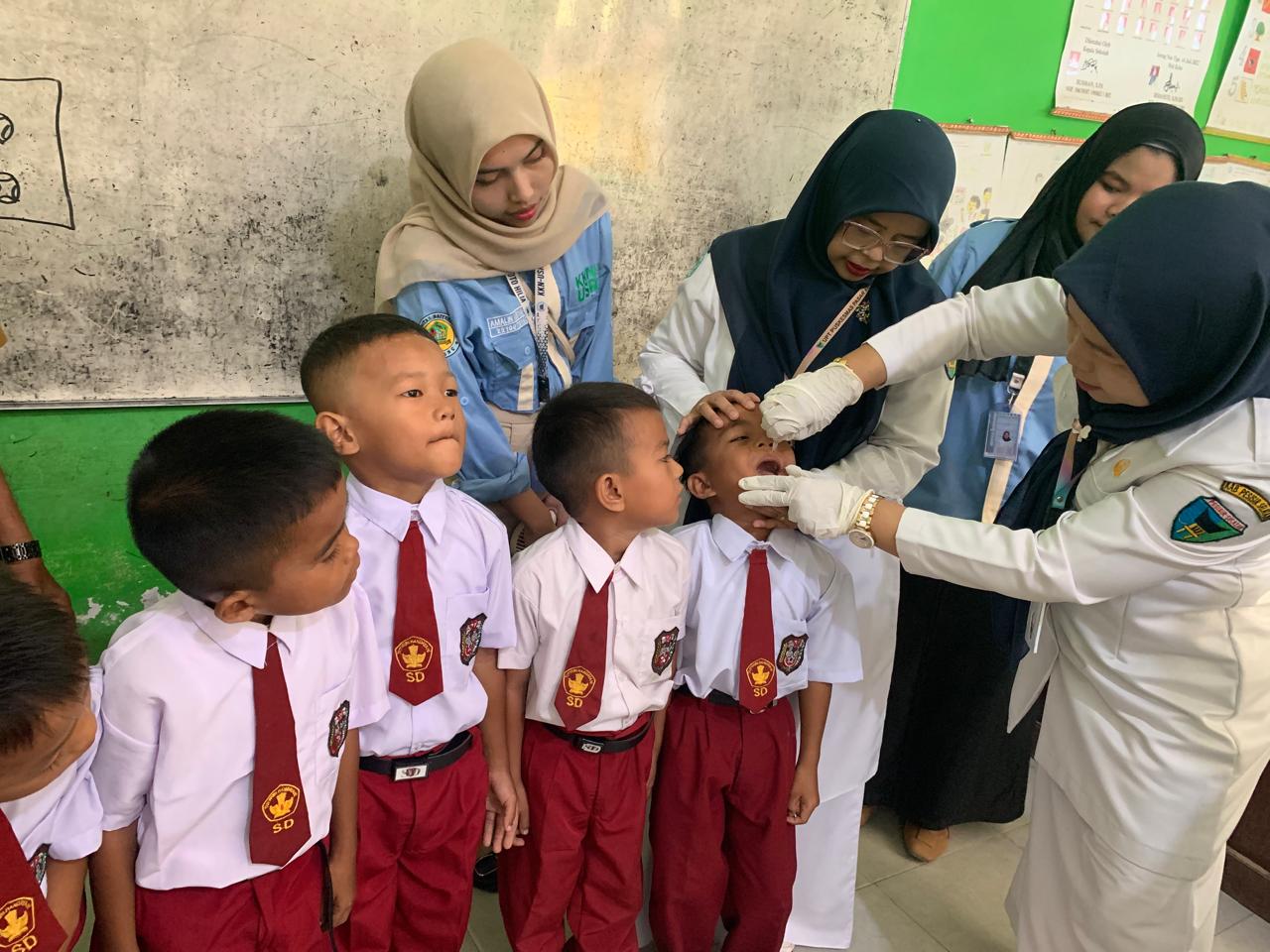 PUSKESMAS PASAR KUOK PIN POLIO PUTARAN 1