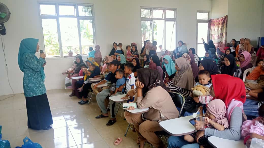 PUSKESMAS PASAR KUOK MELAKSANAKAN PENYERAHAN BANTUAN PMT BALITA STUNTING