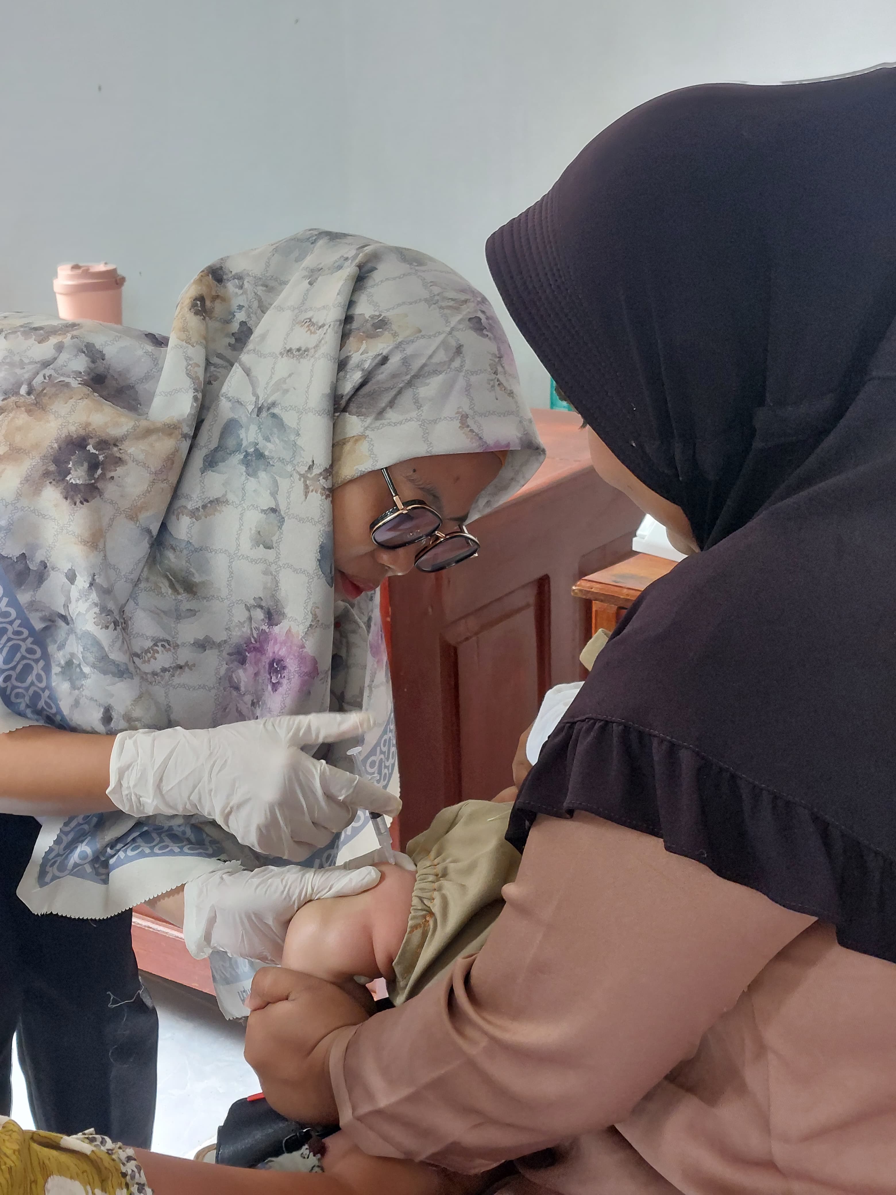 PELAKSANAAN POSYANDU BULANAN RUTIN DI POSYANDU DURIAN TEBAL 1 DAN POSYANDU TUNAS HARAPAN 2 NAGARI PO