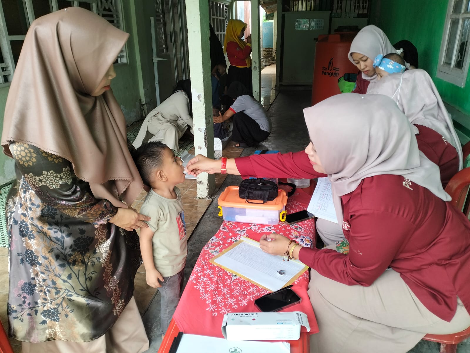 PEMBERIAN OBAT PENCEGAHAN SECARA MASSAL CACINGAN (POPM)  PUSKESMAS IV KOTO MUDIK