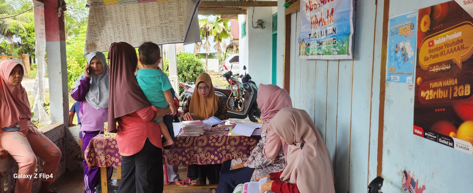 Pelaksanaan Skrining Status Imunisasi bayi dan balita di posyandu Dahlia Dan  Aster.