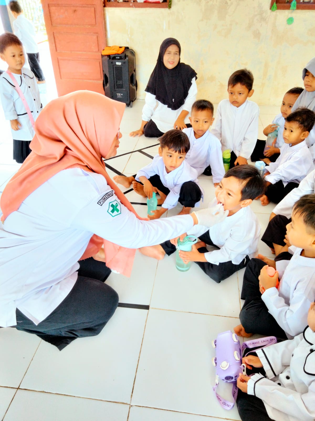 PEMBERIAN OBAT CACING DI TK/ PAUD WILAYAH KERJA PUSKESMAS TANJUNG BERINGIN 