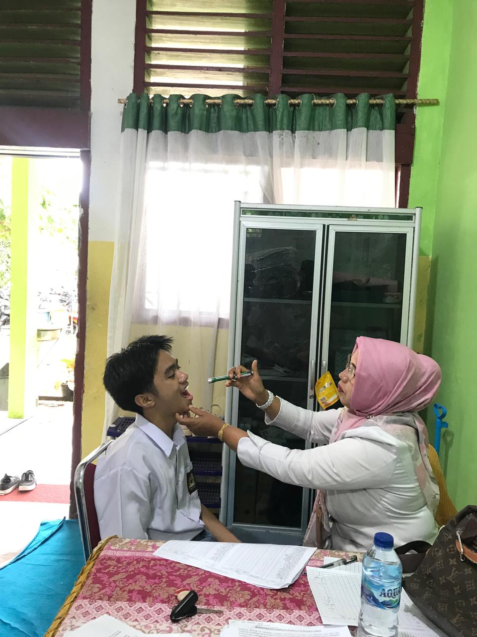 Kegiatan UKS (Penjaringan Kesehatan) Peserta Didik SMAN 1 Lengayang Wilayah Kerja Puskesmas Kambang