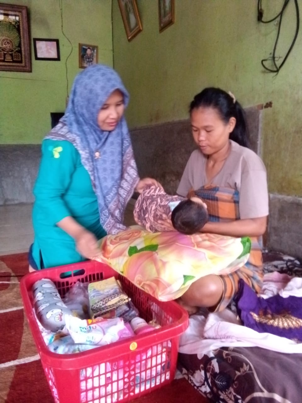  Bidan Desa Lebak Balam Kenagarian Talang Binjai Melakukan Kunjungan Neonatus 