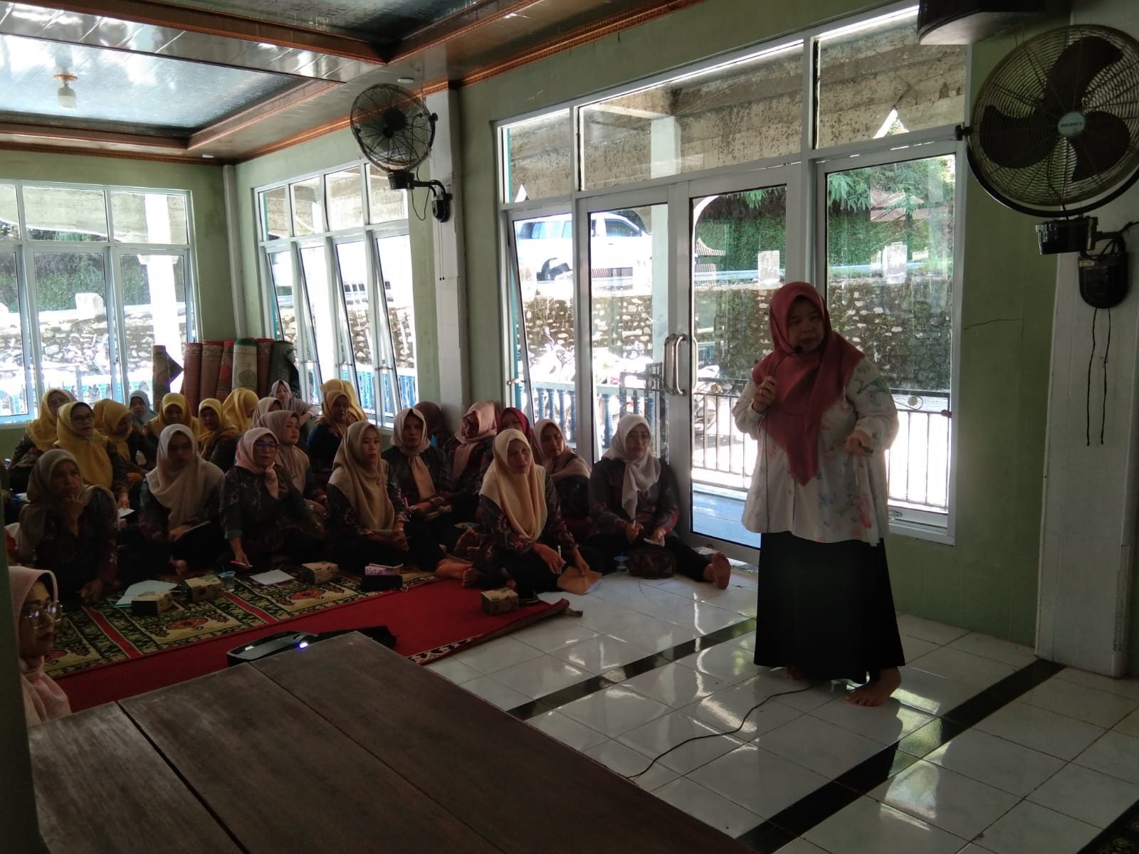 Sosialisasi dan Simulasi Kader Posyandu Dalam Mnerapakan Posyandu Siklus Hidup (ILP).