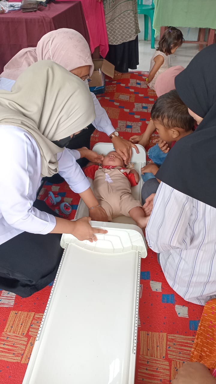 Posyandu Bulanan Rutin Serta Penimbangan Massal dan Pemberian Vitamin A di Wilayah Kerja Puskesmas T