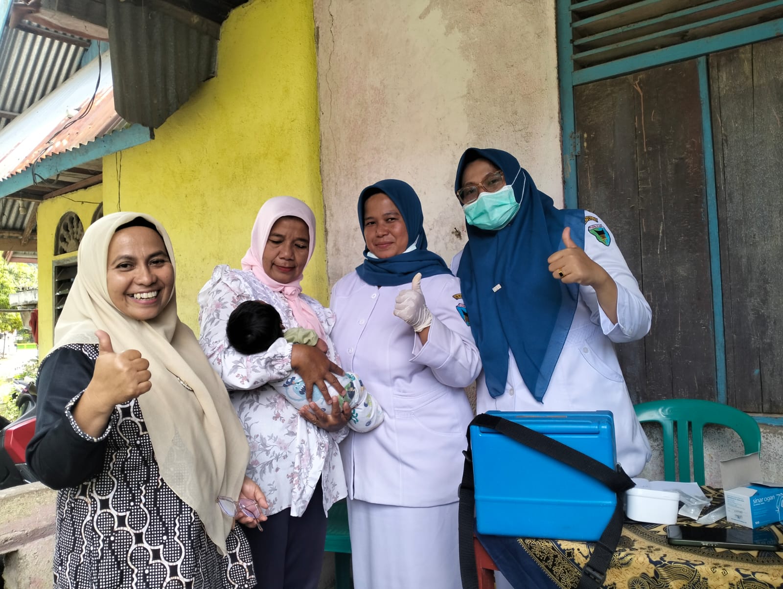 Pemberian Imunisasi Rutin di Posyandu Pada Bayi dan Balita di Wilayah Kerja Puskesmas IV Koto Mudik