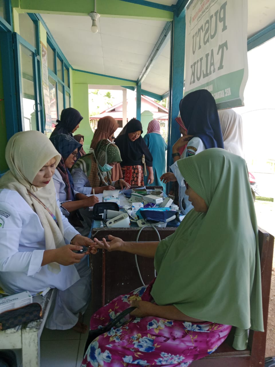 Skrining PTM di Puskesmas Pasar Kuok