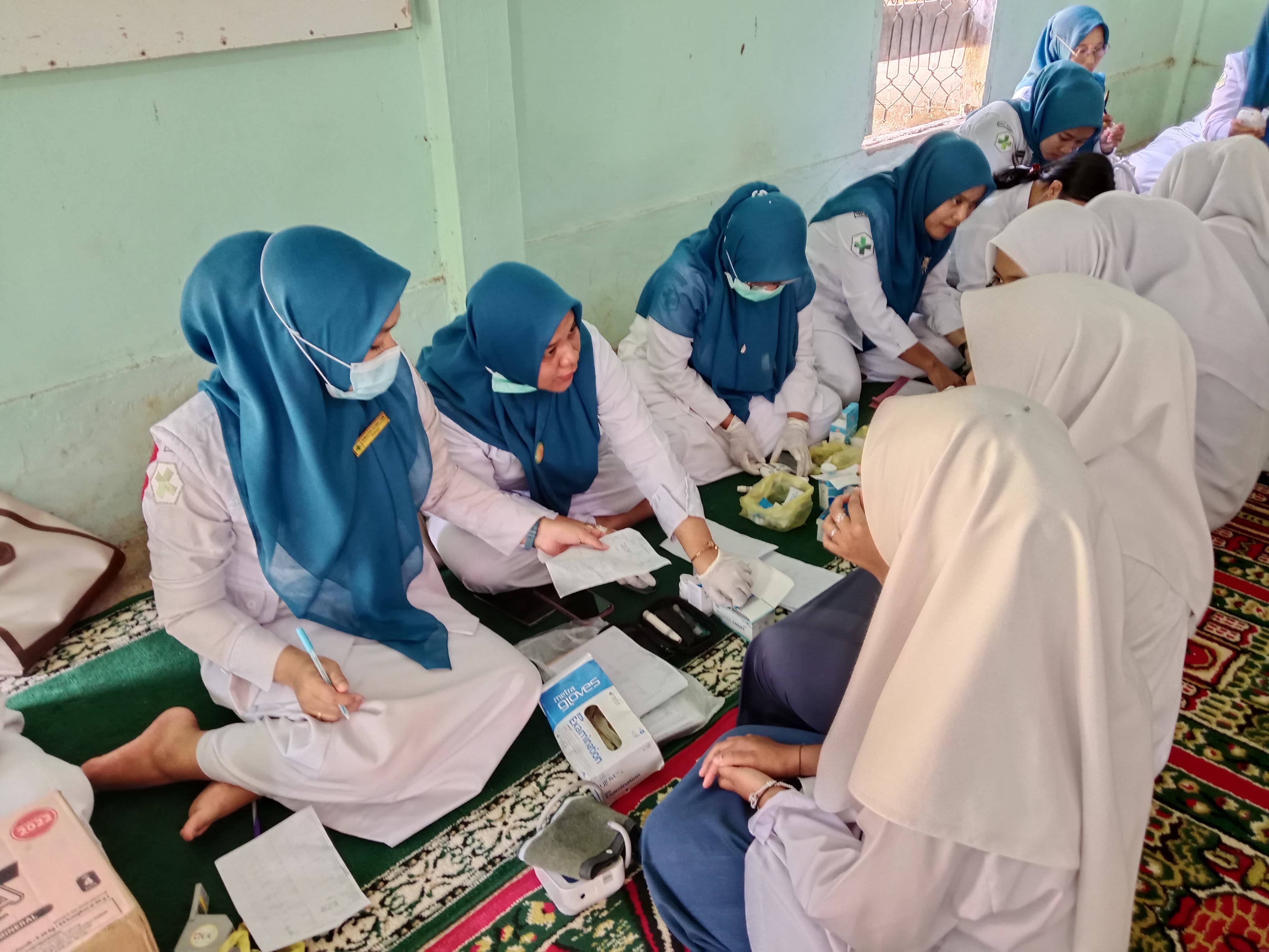 Skrining PTM di MTSN 2 Batang Kapas Wilayah Kerja Puskesmas IV Koto Mudik