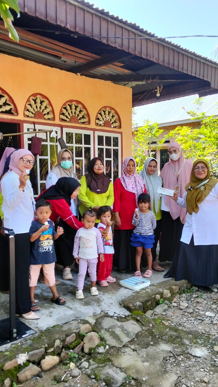 Pemberian Obat Cacing Massal di Posyandu Wilayah Kerja Puskesmas Tapan