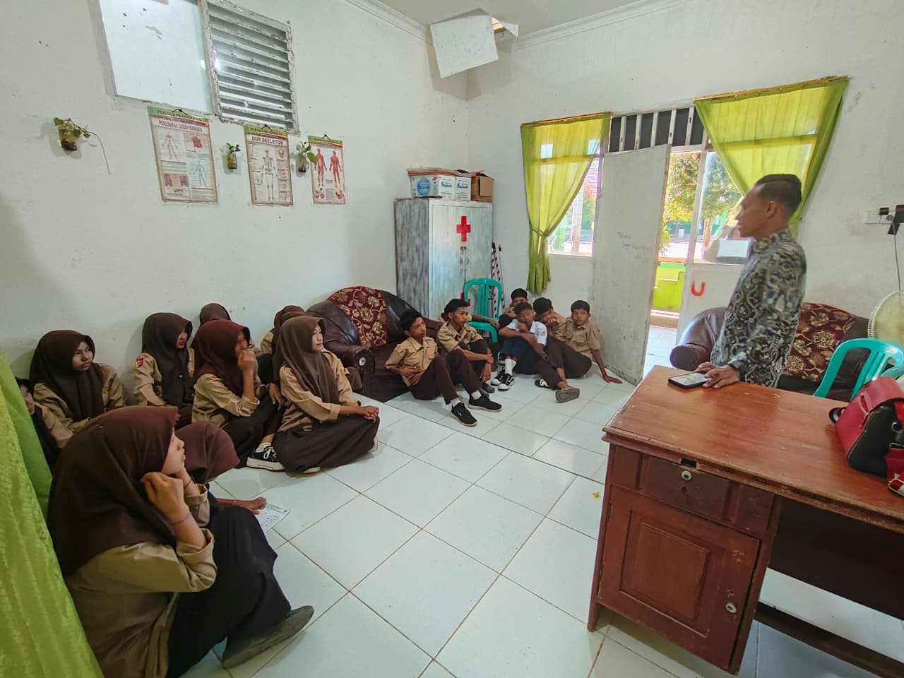 Pelaksanaan Kegiatan Pembinaan dan Penyuluhan PKPR Tingkat SLTP di Wilayah Kerja Puskesmas Koto Baru