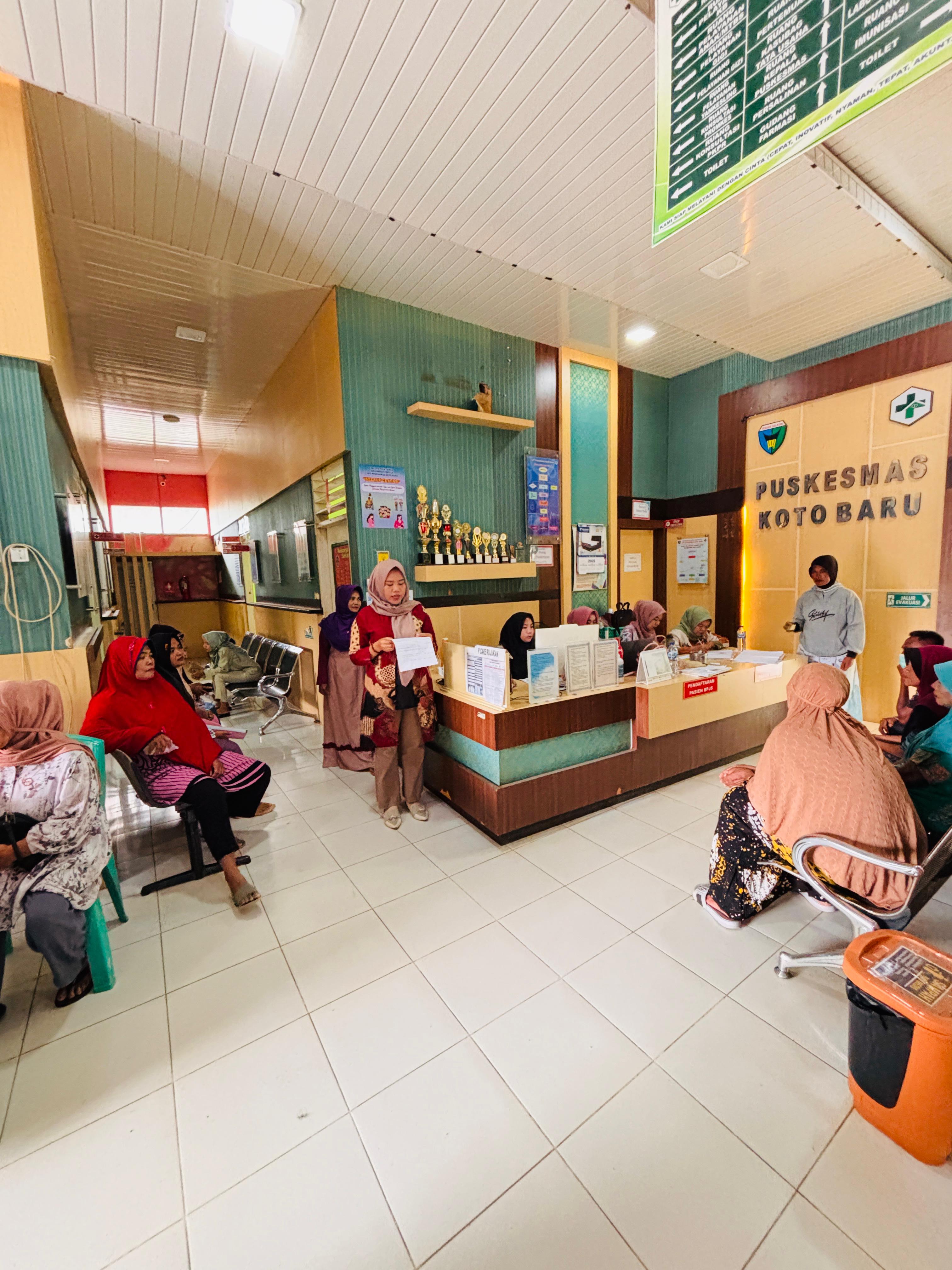 Penyuluhan dalam gedung di UPT Puskesmas Koto Baru Tentang DBD